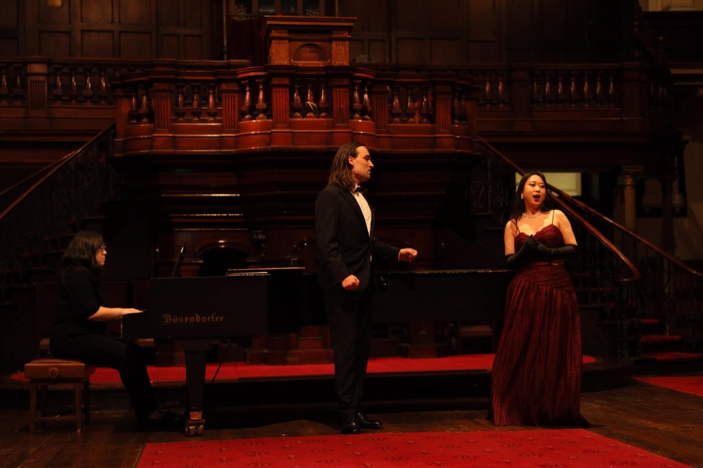 Aleta Shang in recital with a pianist and baritone